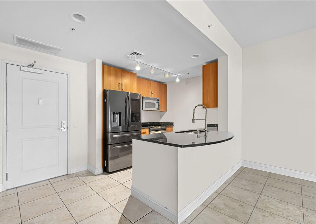 Modern kitchen with stainless steel appliances
